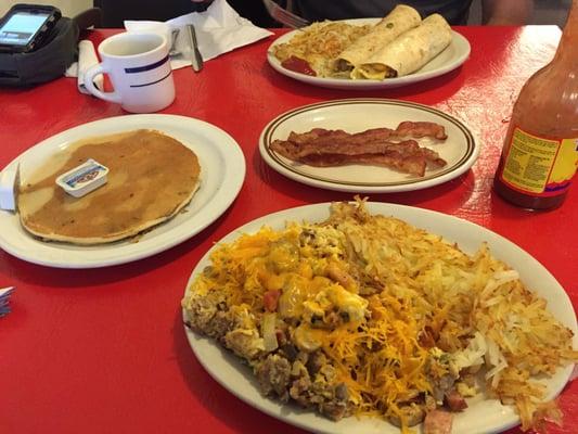 Yummy food!! Breakfast burrito, bacon, blueberry pancake, and garbage scramble!!