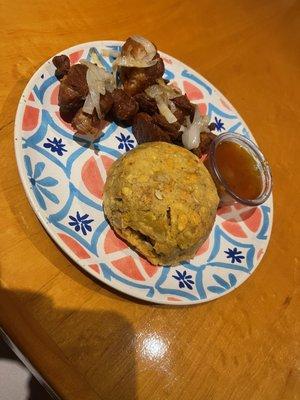 Mofongo with fried pork carnitas