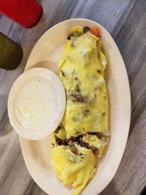 Cheesesteak omelet with grits