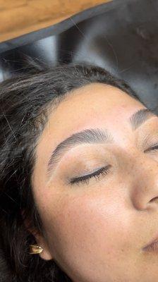 Brow wax + styling