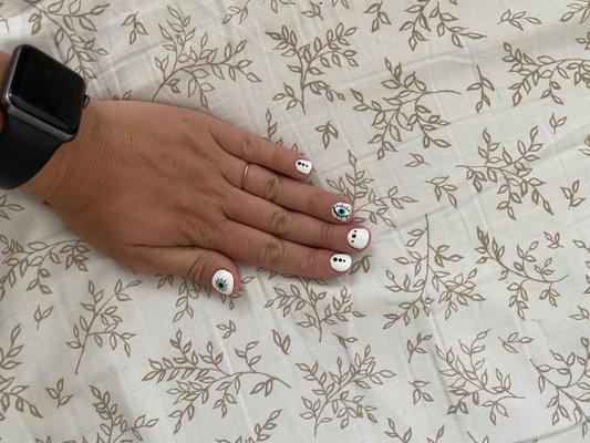 White gel mani with a cute design. Thank you Phillip!