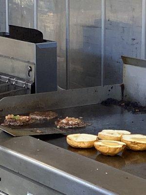 Burgers on the grill.