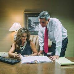 Attorney Ken King and Attorney Leah King reviewing Workers Compensation Case