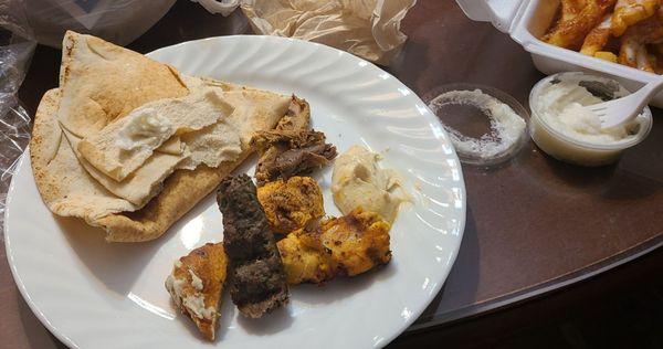 Shish kafta,  Shish tawook, hummus and pita