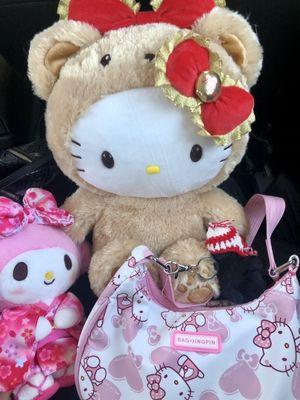 Hello kitty and My Melody. (Hello kitty purse was bought at a different store)