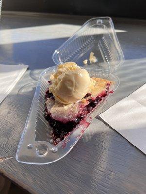 Blueberry Pie Slice with vanilla ice cream. So good! I couldn't resist taking a bite before snapping the photo.