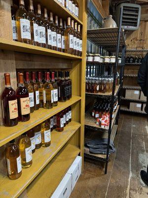 the store has a winding path where goods are displayed, such as this array of apple wines made on property