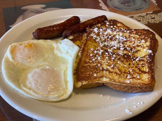 Vanilla cream French toast with sausage and eggs