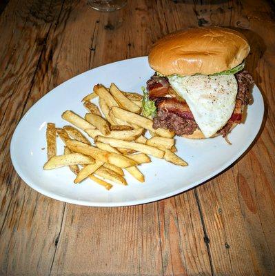 OG SMASH BURGER | 1/2 pound of two smashed beef patties, caramelized, goat cheese, egg, avocado, bacon, on a brioche bun.