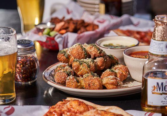 Atomic Cowboy home of Denver Biscuit Co & Fat Sully's NY Pizza, loaded garlic knots