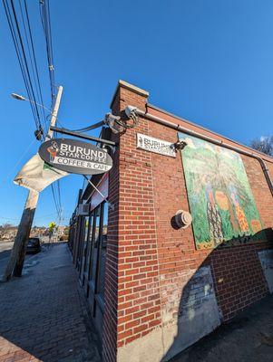 Entrance, artwork, state of Maine flag.