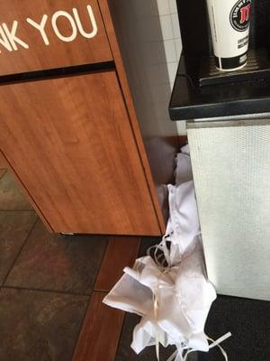 Unprofessional. Placing aprons in between the soda machine & trash can due to a leak(?). I'm pretty sure there's a better way.