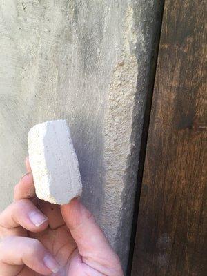 A sample of finish stucco from my guys compared with the garbage concrete aggregate by company ojai door and window.