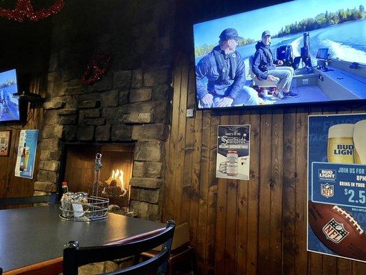 Fireplace and a number of TVs