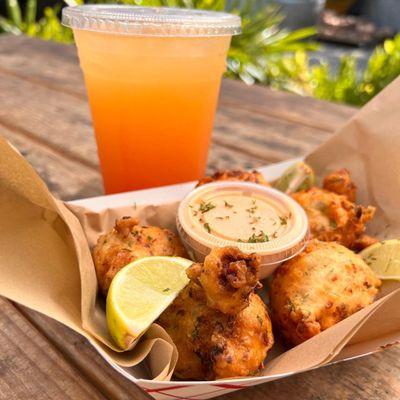 Our Caribbean Conch Fritters With Our Haitian Paradise Lemonade.