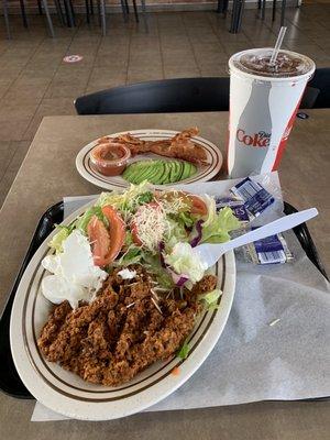 Taco salad with a side of bacon and avocado