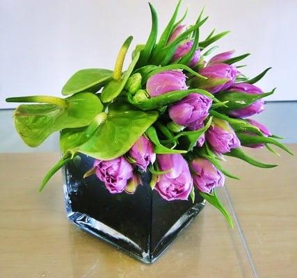 Green Anthuriam and Purple Tulips in Glass