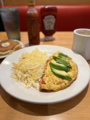 ABC omelette with  added, pancakes shredded hash browns and coffee. So good! Cannot even try to eat those pancakes lol