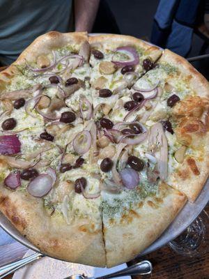 Basil & Bird ($29/$35) pesto, chicken, garlic confit, mama lil's peppers, red onion, taggiasca olive, oregano