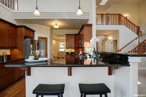 Shined kitchen for staging, other angle.