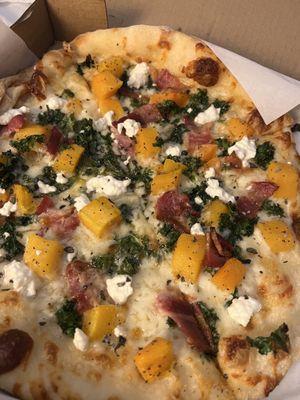 Seasonal butternut squash kale and bacon pizza. Delicious!!