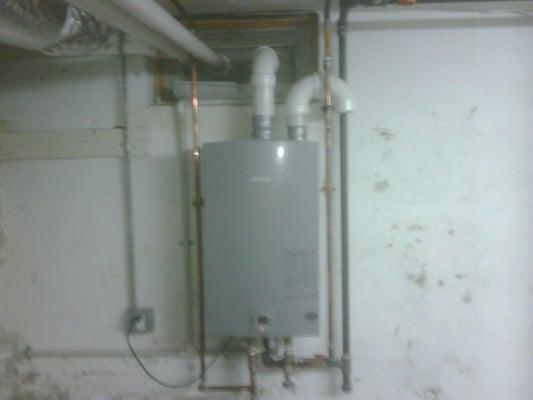 Super efficient tankless on demand hot water heater