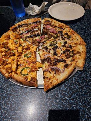 This is three different pizzas. Starting at the top going clockwise. Smokehouse BBQ, Risk it for the Brisket, and Buffalo Chicken!