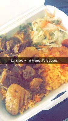 Curry Goat, cabbage, carrot rice, plantains... goat a little too many bones but the food was decent.