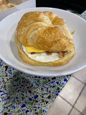 Croissant with bacon egg and cheese