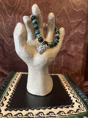 Bracelet in silver and malachite stones and jaguar pendent