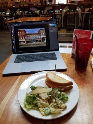 Half sandwich and Ceasar salad.