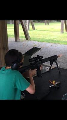 My son shooting my Triton AR-15 at C2 Shooting Center built by Chris at DOA Arms.