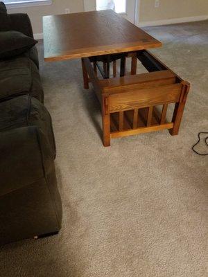 Lift top coffee table.