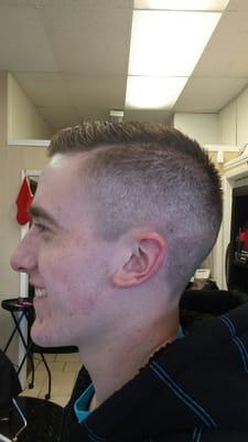 Side view - high fade with a line cut at the part in my hair