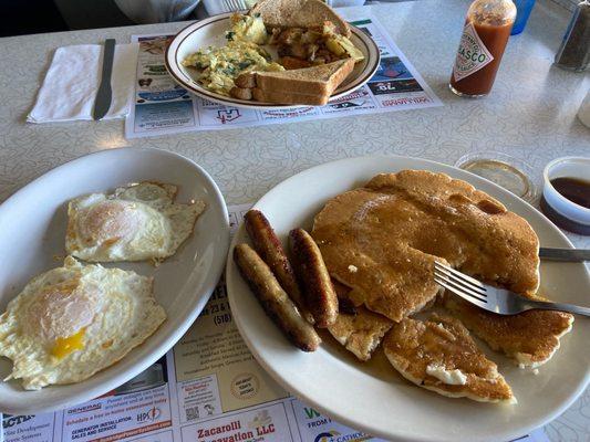 Pancakes, over easy eggs, Florentine omelette, home fries