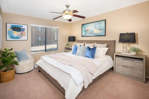 Bedroom with ceiling fan at The Palisades in Paradise Valley