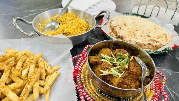 Chicken Biryani Chicken Karahi Plain Fries with chaat masala Butter Naan