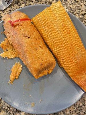 Tamale with twist tie in it.