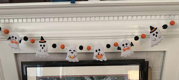 Cute ghosts hanging out on my fireplace.