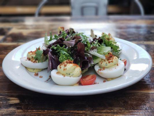 Deviled eggs with a salad