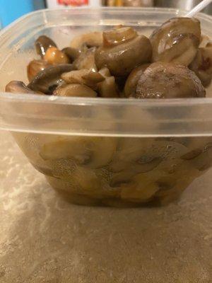 Mushrooms, tough/rubbery meat I couldn't chew and the small amount of beef I received