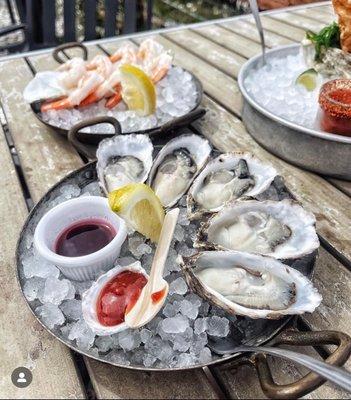 Clausen oysters on the half shell & shrimp cocktail with house mignonette, cocktail sauce & lemons.