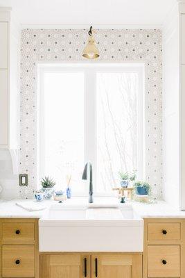 Bathroom countertop, hardware, designer lighting, and backsplash selections