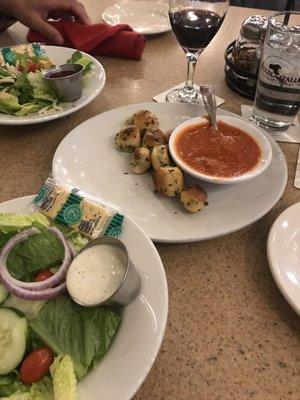 They offer a side salad as an add on and the garlic knots are one of their select appetizers