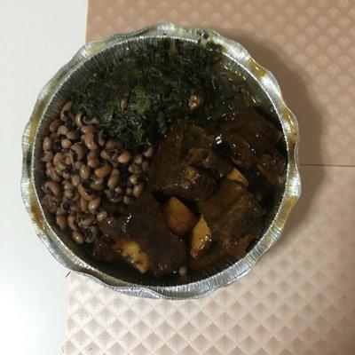 The barbecue ribs with beans and spinach