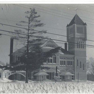 Taken in the 1950's, the tree in the foreground is now gone and the two smaller buildings are off to the left.