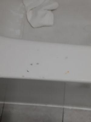 cigarette burns on side of tub