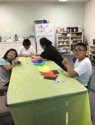 Kids excited to learn how to make Origami