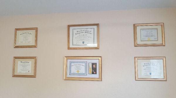 Dr. C's Diplomas & certs are going up all around the office. An Extensive educ. background. Check them out during our grand opening soon!