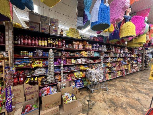 Variety of Mexican candies and piñatas